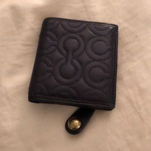 Dark purple Coach mini wallet